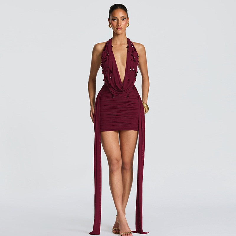 Sexy deep V-neck dress with neckline, exposed back, and hip-baring design, adorned with personalized water droplet decorations